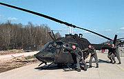 OH-58A 奇奧瓦 是一種4功能的偵查直升機。奇奧瓦可以容納兩位駕駛，但設計中左邊的儀表版被移除，當成單純的觀測員座。而觀測員的任務是定位敵人目標並回報和引導炮兵攻擊。基於越戰的經驗，機上還裝了M134 7.62 mm 電動機槍。