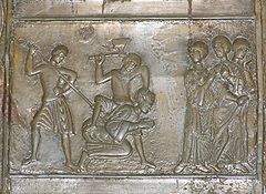 格涅茲諾門的一部分，描繪普魯士人殺害傳教士主教聖阿德爾伯特的中世紀雕刻，約1175年建成。