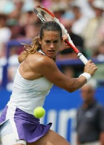 反手揮拍：backhand swings（圖為：法國女子瓦尼古選手——毛瑞斯莫）