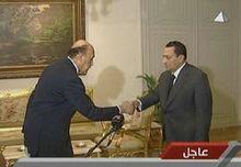 奧馬爾&middot;蘇萊曼（左）