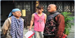 許江華導演和潘長江拍攝《毛驢縣令》